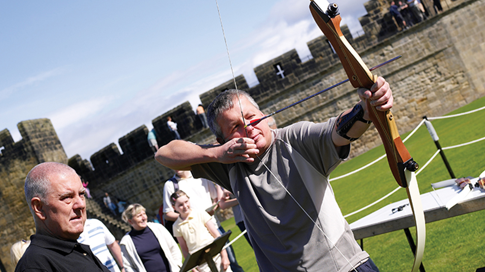 Archery Visitor Firing Arrow
